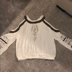 White free people top with sequins.